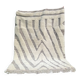 Large hand-knotted beige and cream Berber rug, 2.90m x 1.80m.