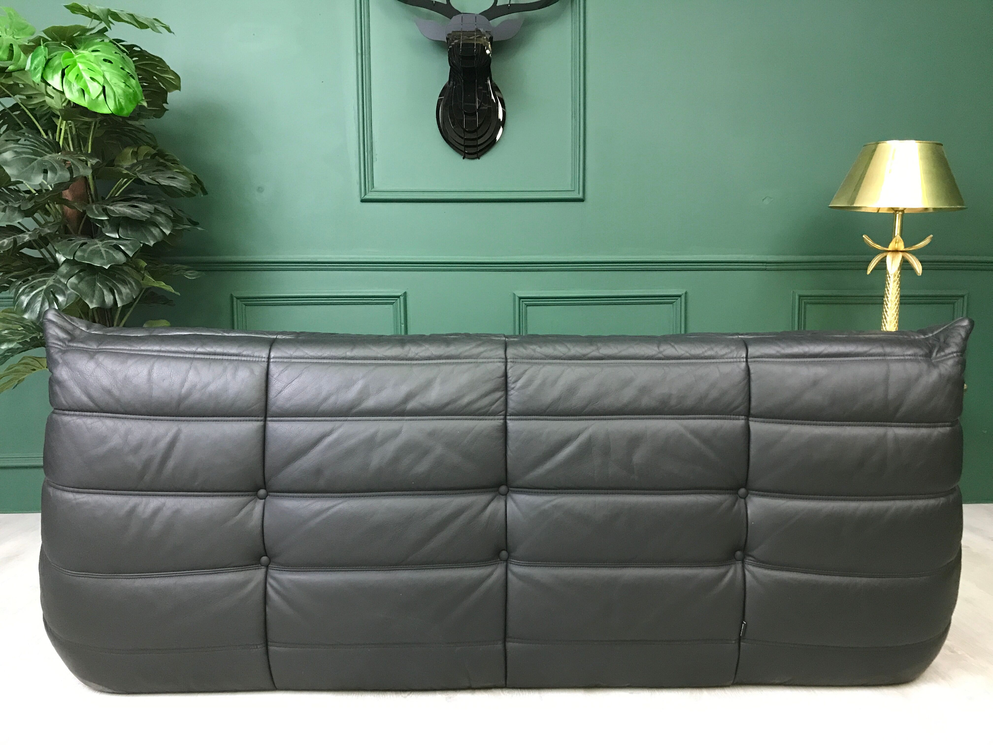 Black leather three seater sofa Togo by Ligne Roset