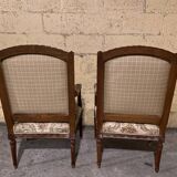 Pair of antique carved wooden armchairs