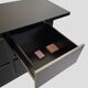 Black lacquered 4-drawer cabinet by David Lange with a lacquered top.
