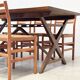 Set of six walnut and rattan dining chairs