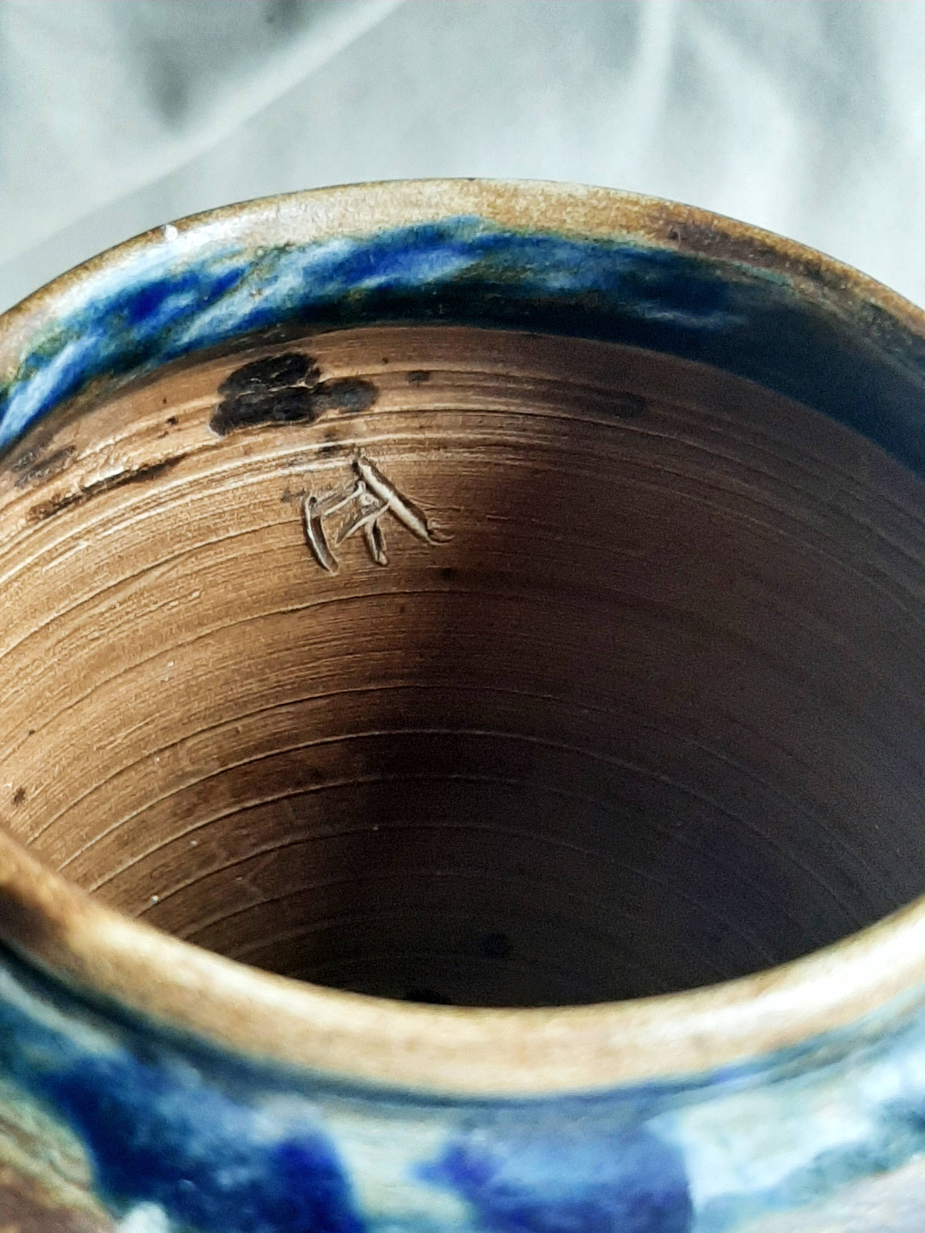 Glazed stoneware vase signed