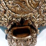 Patinated bronze holy water font