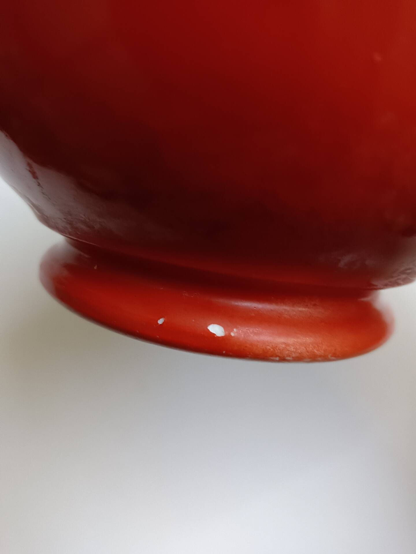 Red bowl with white polka dots in Longchamp ceramic