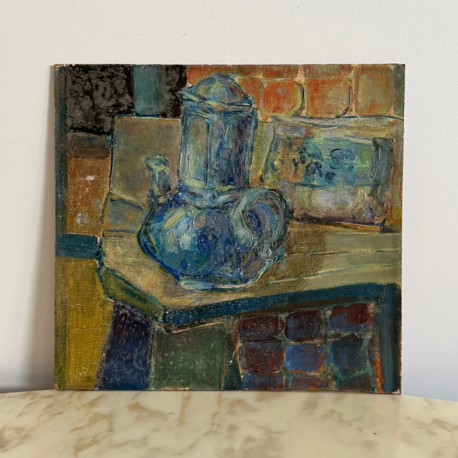 Oil on Isorel depicting a blue teapot, 20th century.