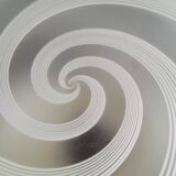 Frosted glass globe ceiling light with spiral patterns.