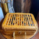 Wicker and wood suitcase