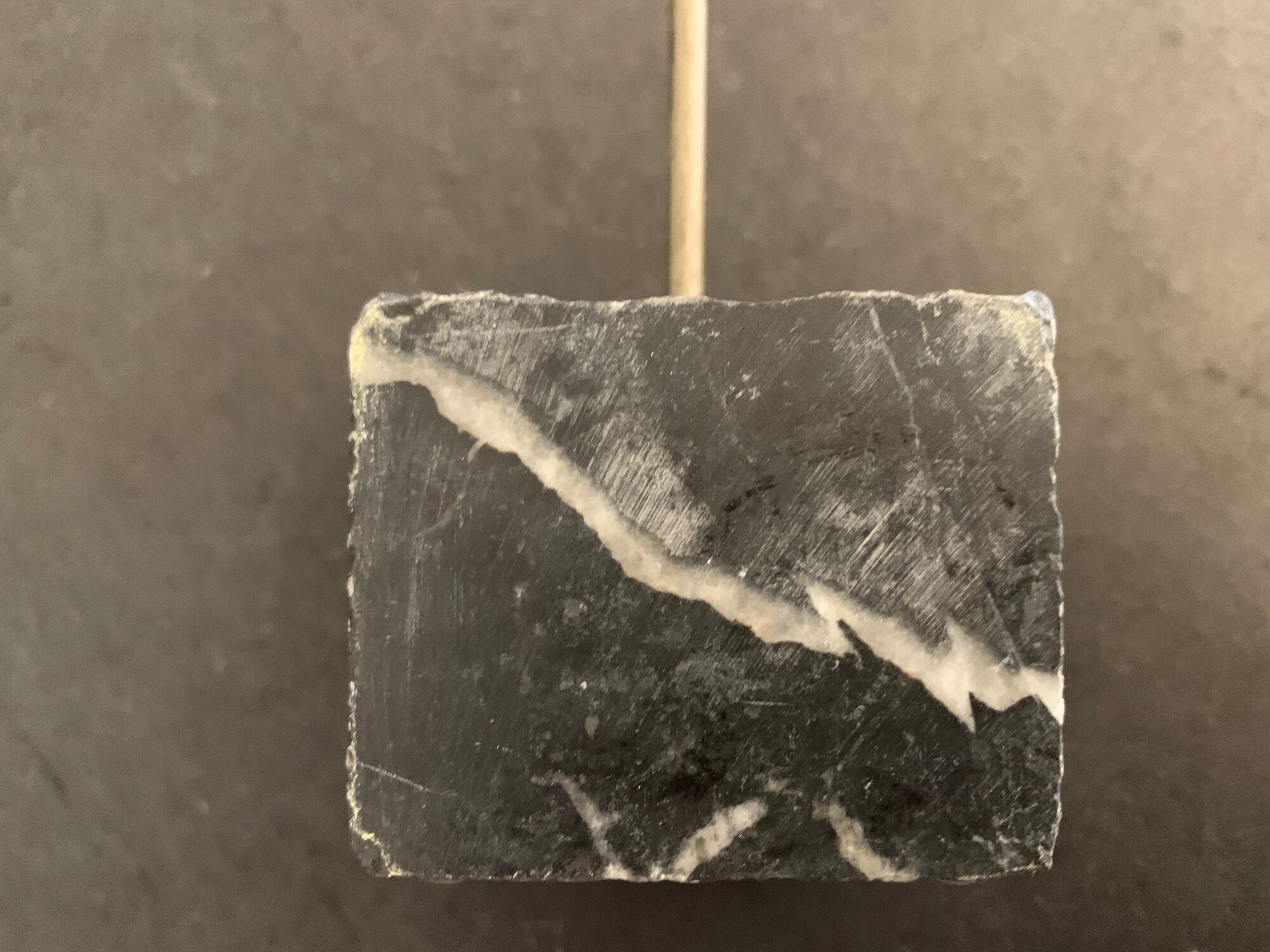 Swedish design candle holder in granite, metal and brass, 1980, height 39 cm