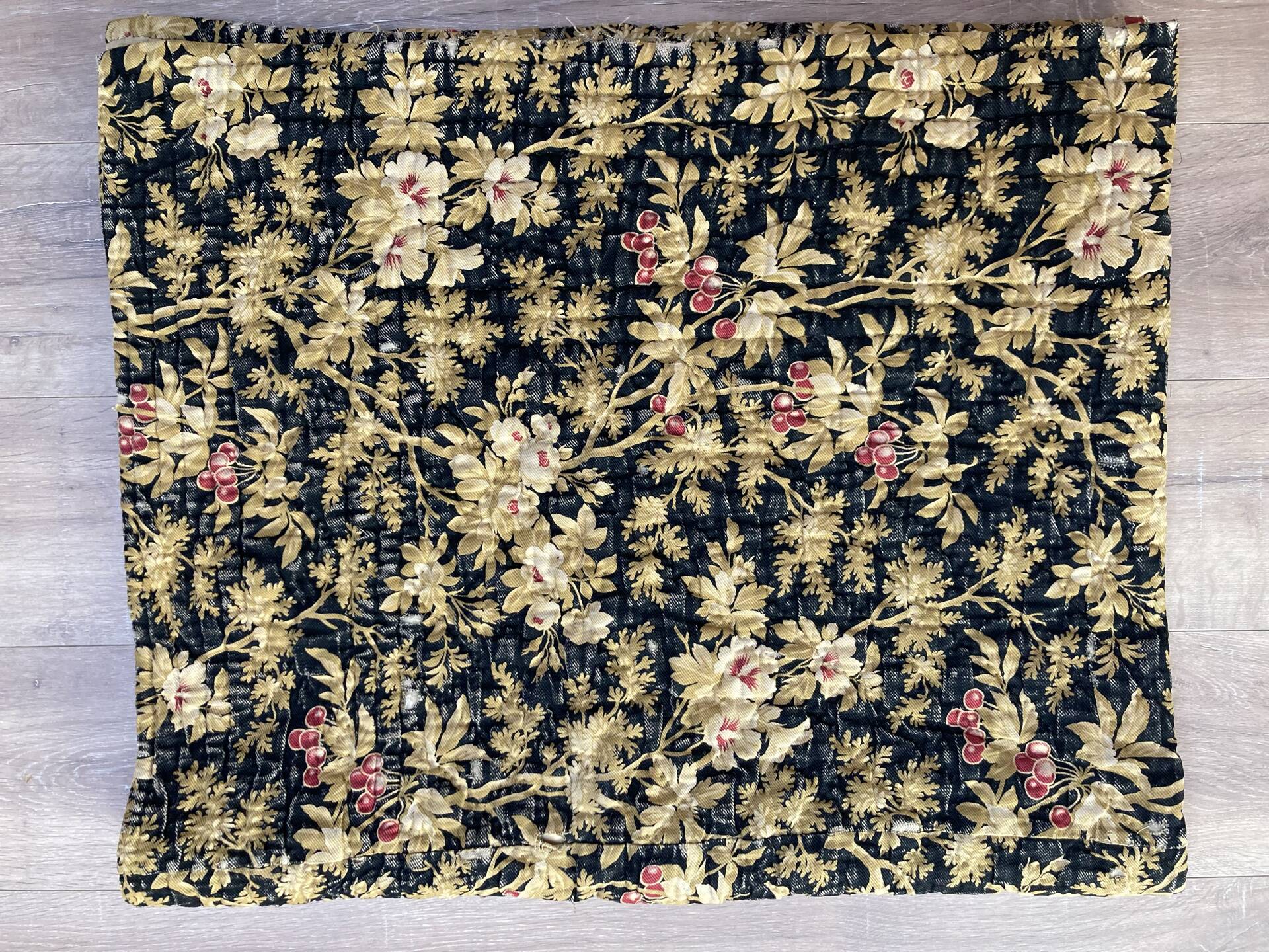 Antique hand-stitched boutis bedspread, floral fabric, 19th century.