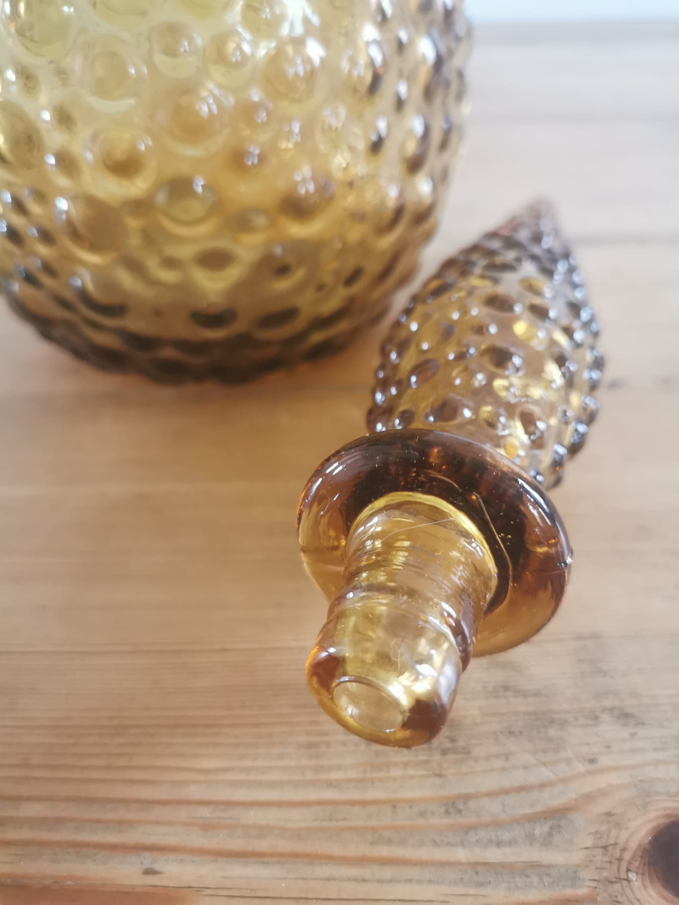 Amber-colored empoli glass decanter
