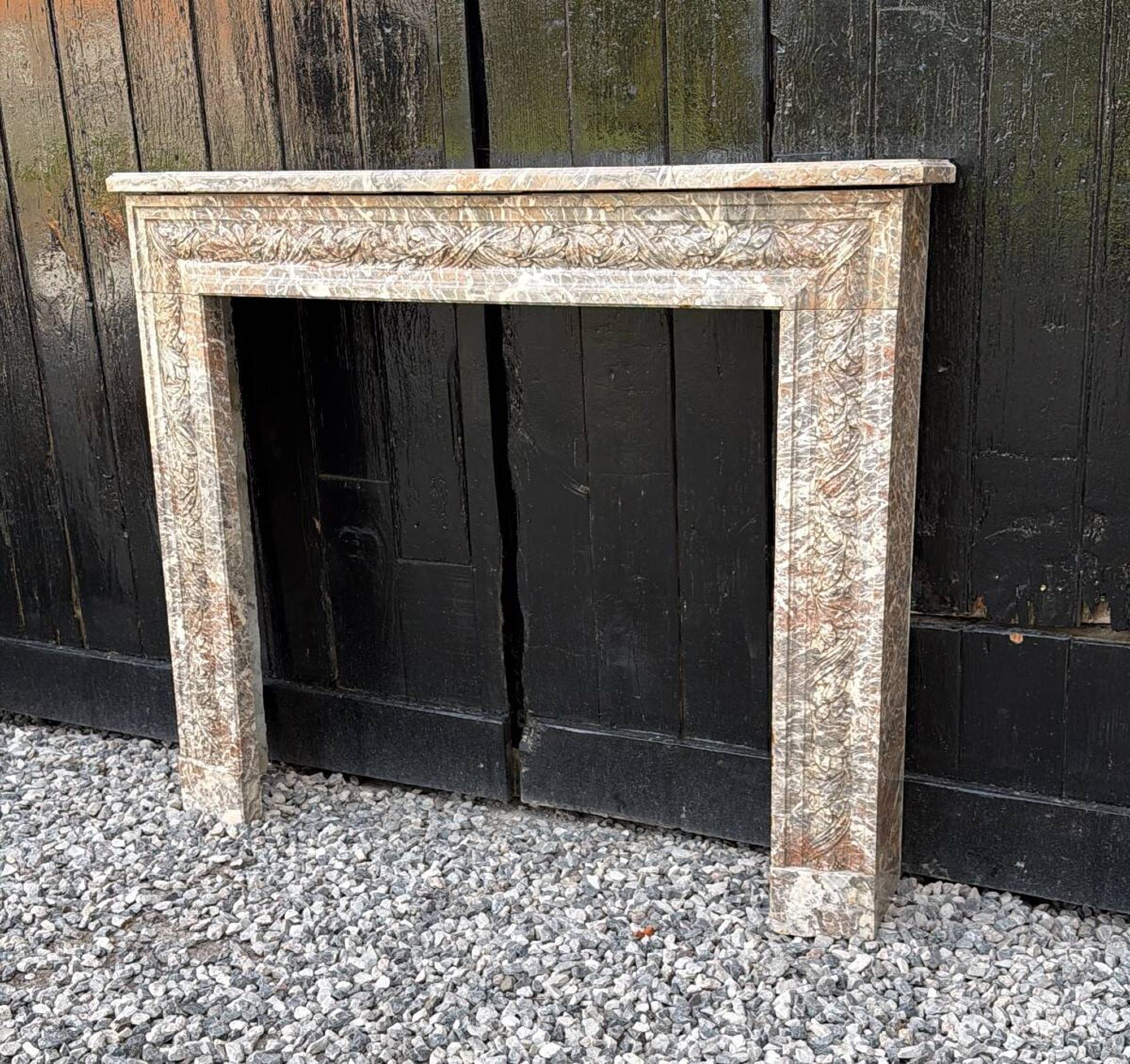 Louis XVI style fireplace in grey Ardennes marble, circa 1900.