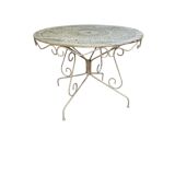 Old garden table in solid wrought iron