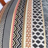 2 varnished solid wood chairs with "ethnic" padding