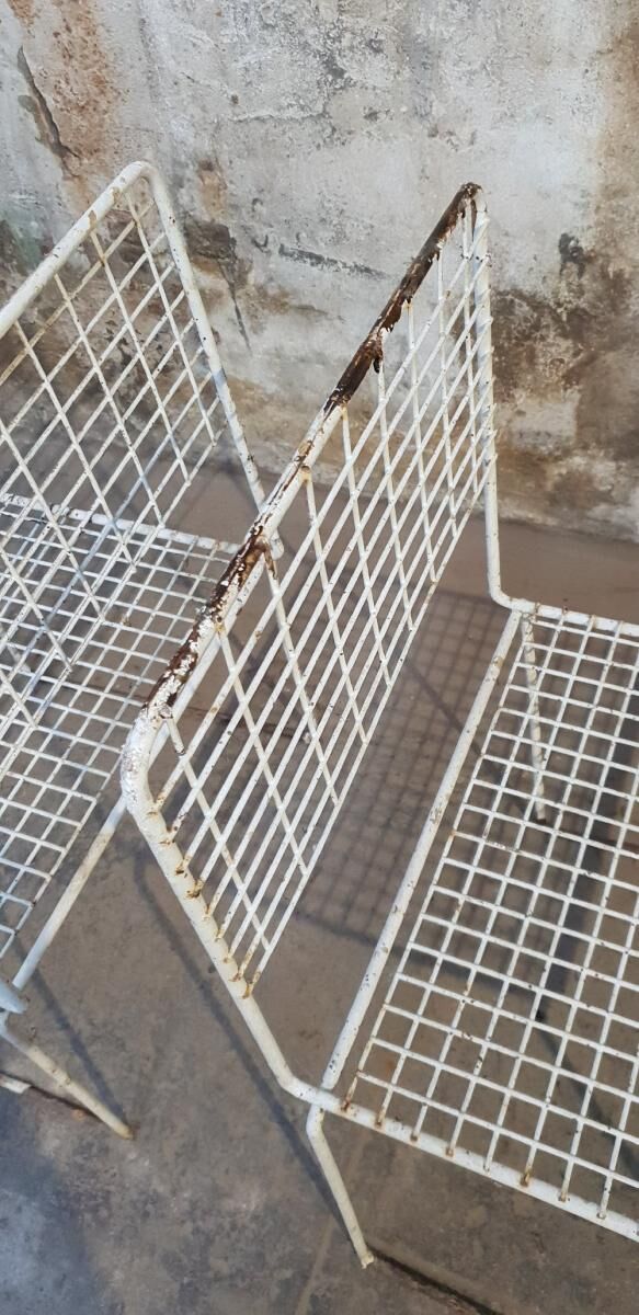 Two vintage metal chairs