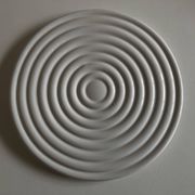 White glazed earthenware potter's trivet
