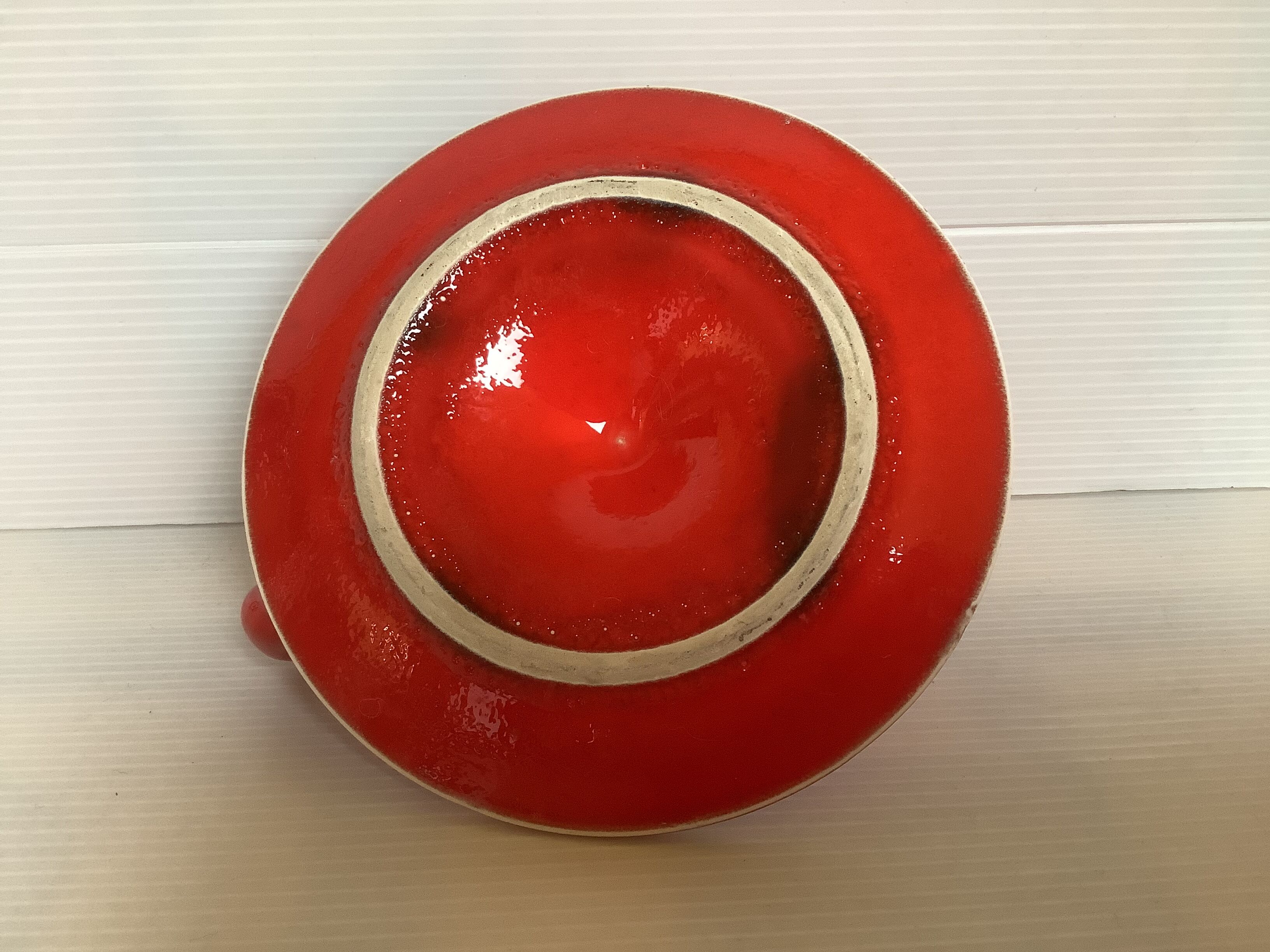 Red ceramic cellar rat candle holder