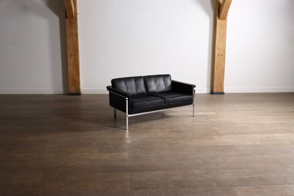 Horst Brüning Model 6912 two seater sofa in black leather for Kill International, Germany 1967