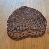 Small wicker basket in the shape of a heart.