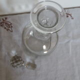 Hand-cut glass decanter, faceted glass cap