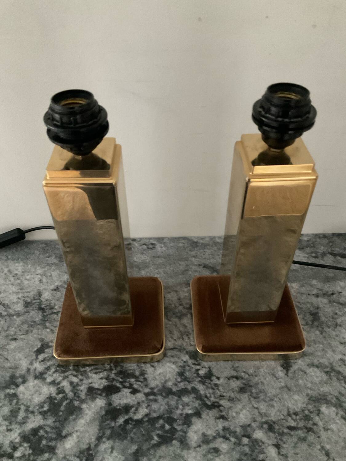 Pair of Hollywood Regency brass table lamps from the 1970s.