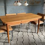 Extendable teak dining table