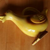 Ceramic watering can in white earthenware, yellow enamel and bird shape