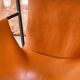 Leather and metal armchair