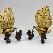 Pair of Hollywood Regency sconces in carved, painted and patinated wood, 1950s