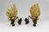Pair of Hollywood Regency sconces in carved, painted and patinated wood, 1950s