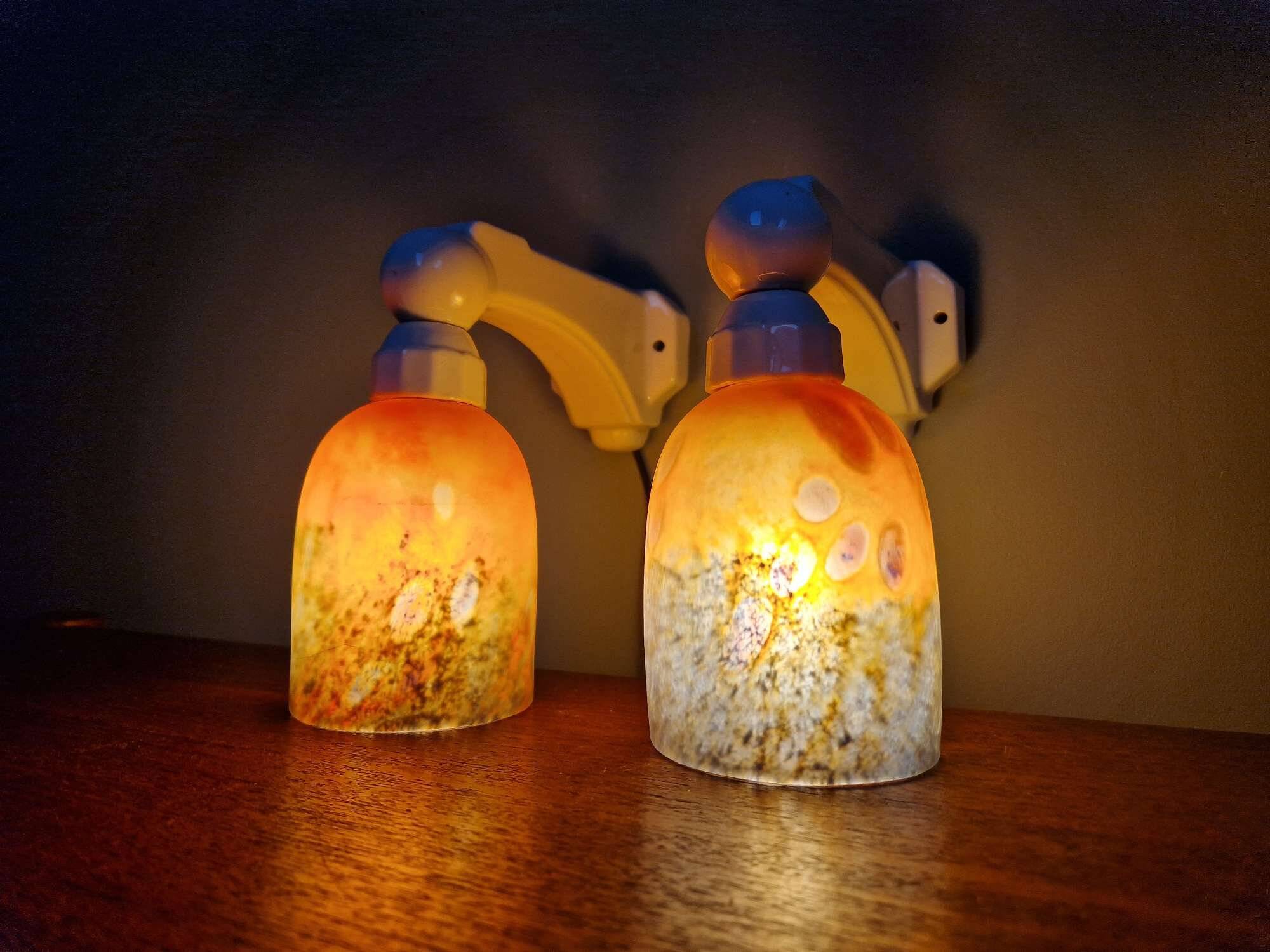 Pair of Art Deco wall sconces in multicoloured porcelain and frosted glass.