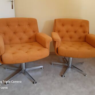 2 1970s swivel armchairs orange fabric