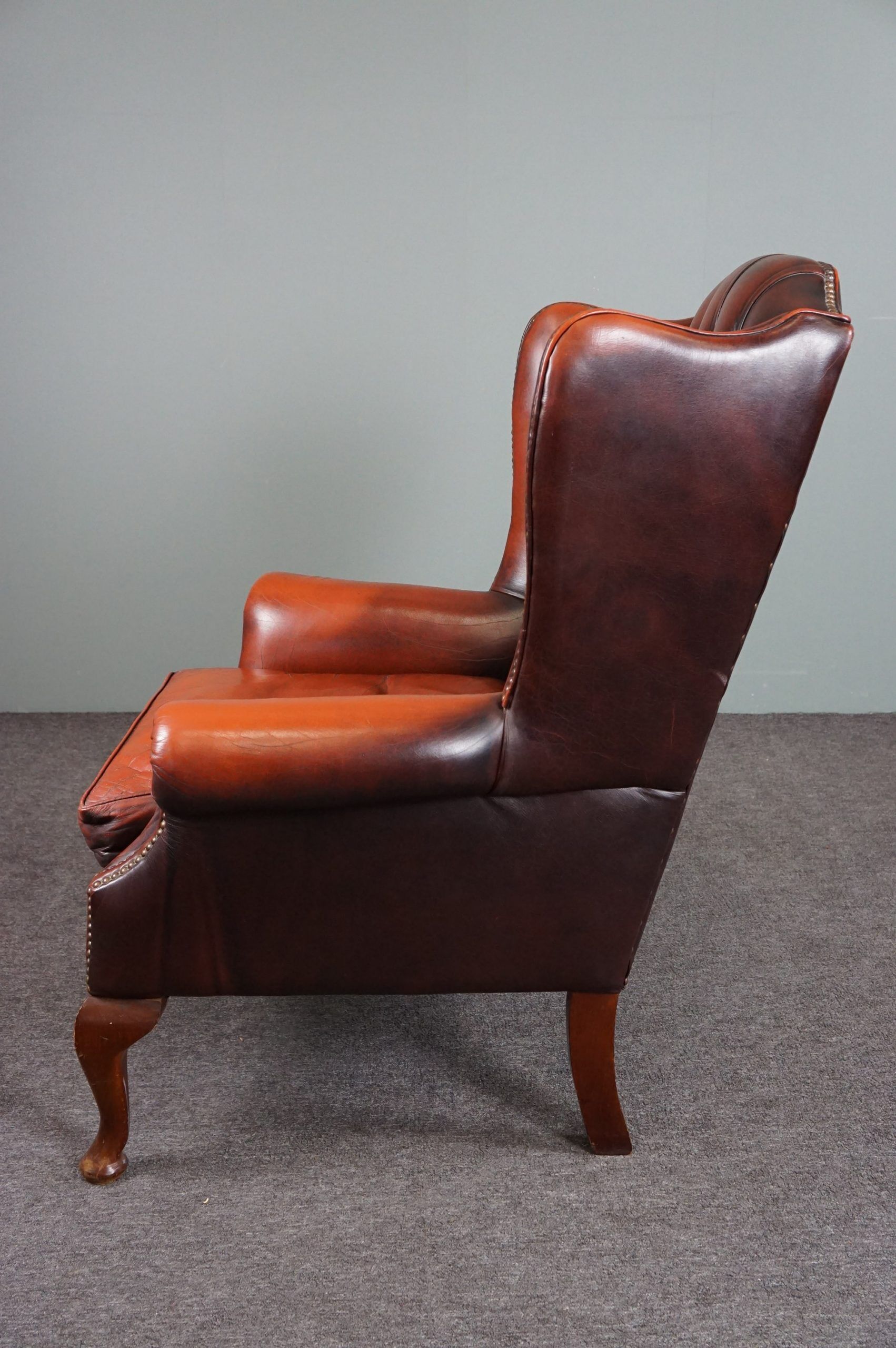 Fauteuil Chesterfield en cuir de vachette