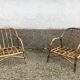 Pair of rattan armchairs and vintage oval table