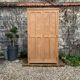 Parisian paneled cabinet in raw wood, 1940