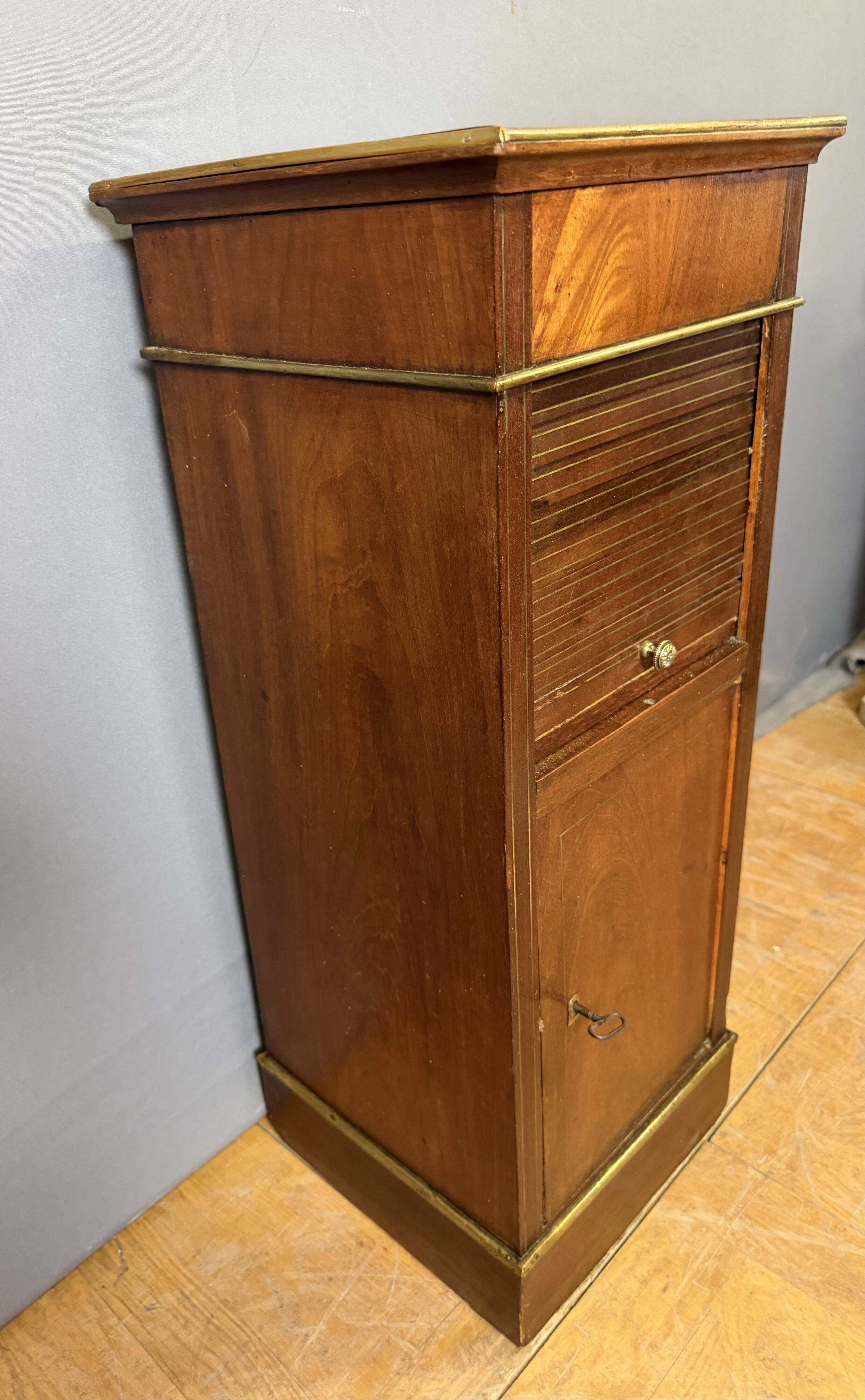 Directoire bedside table in mahogany and brass