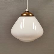 Beautiful ball-shaped hanging lamp in white opal glass with brass top.
