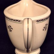 Antique milk jug in Gien earthenware, Valence model A040.