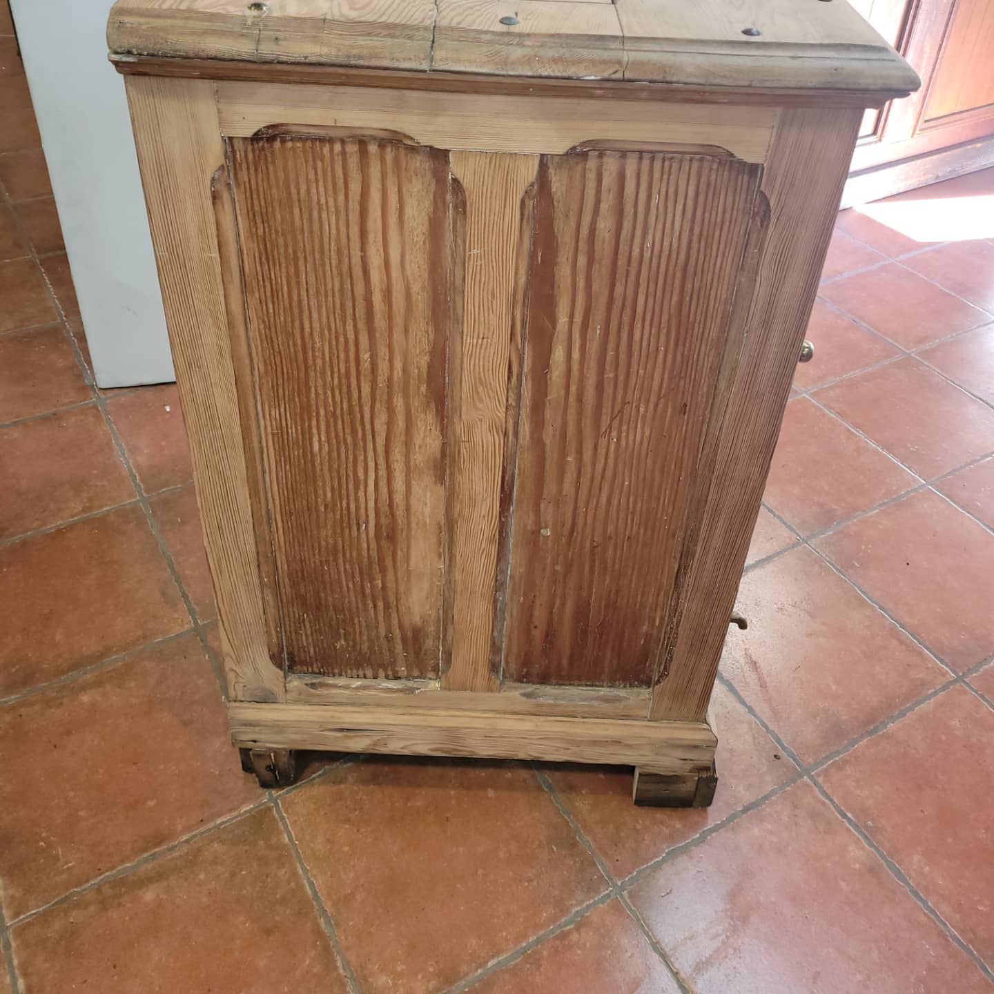 Antique cooler with a door