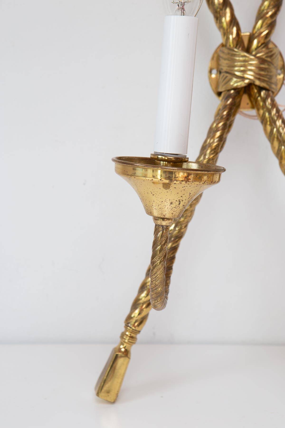 Pair of large gilded brass Noeud wall lights