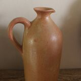 Vintage stoneware liqueur bottle with handle