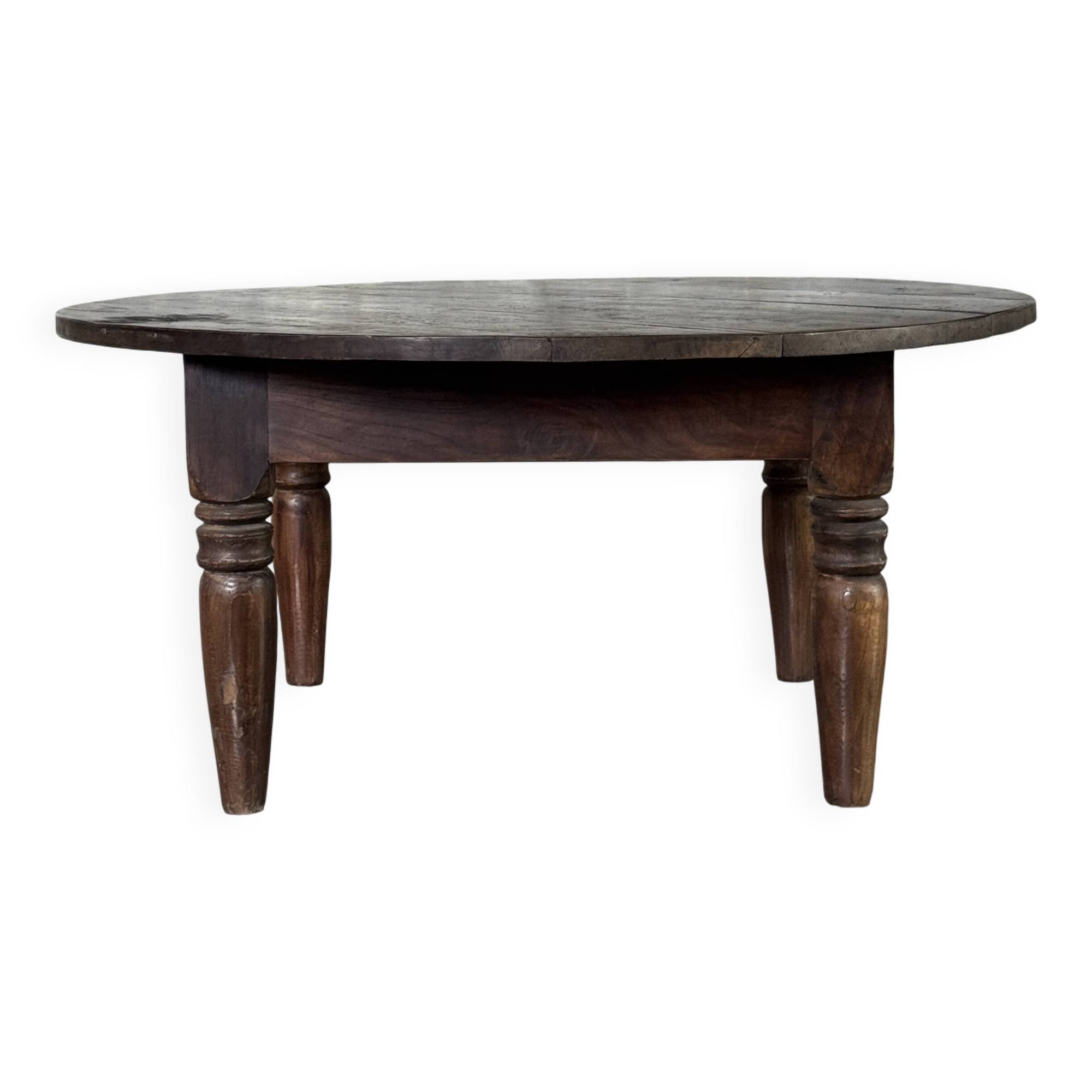 Coffee table, round antique Indonesian teak table with straight legs.