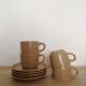 Stoneware cups and saucers