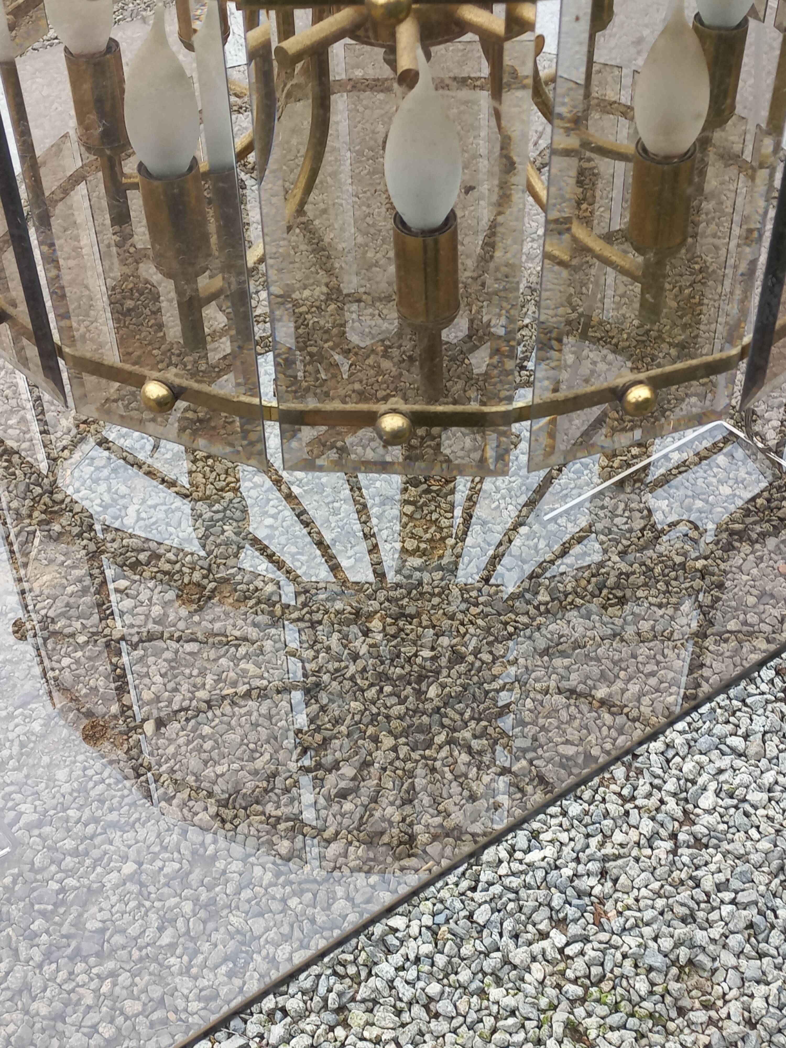 70s designer chandelier with smoked glass plates and gold metal frame