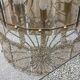 70s designer chandelier with smoked glass plates and gold metal frame