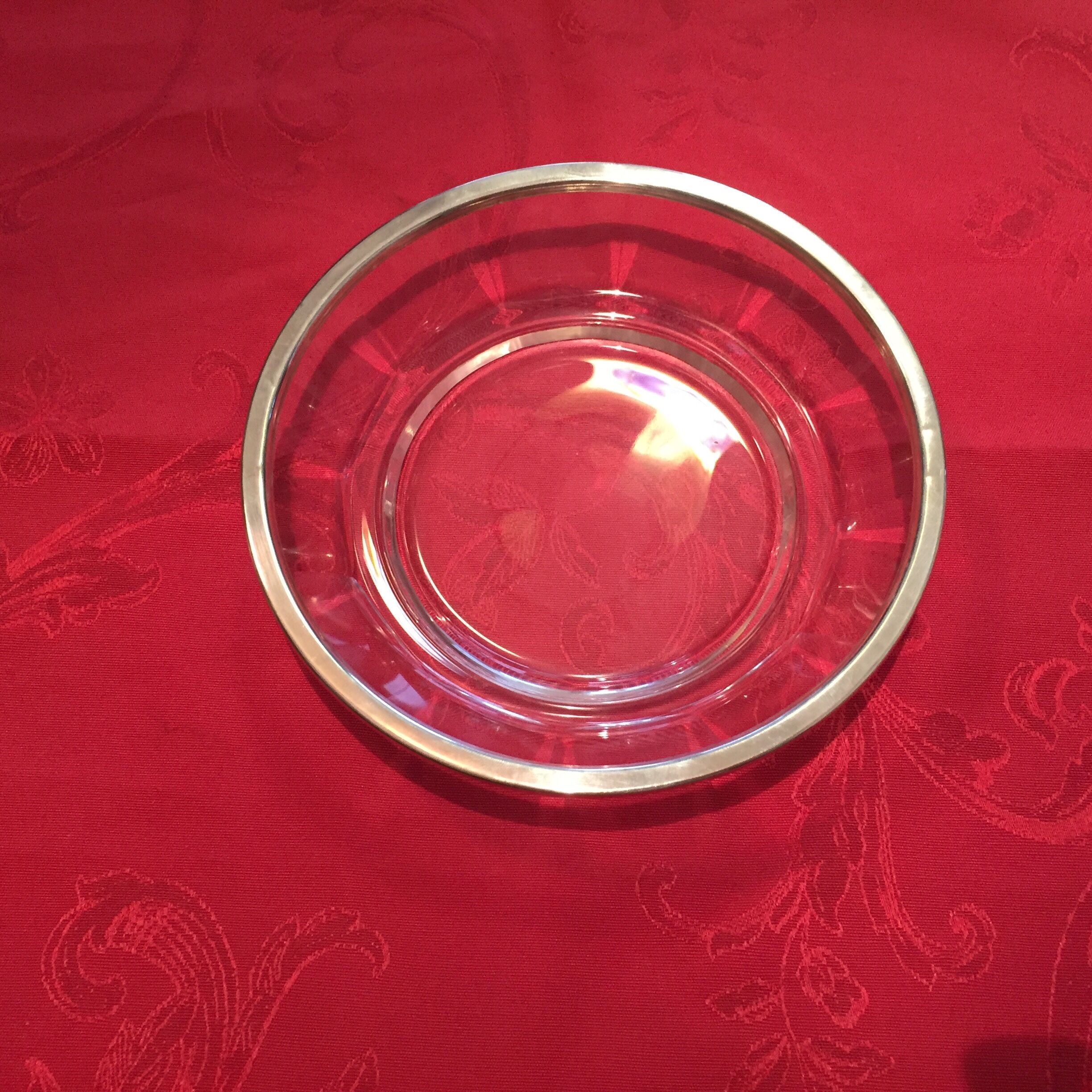 Very beautiful crystal cup with silver metal rim