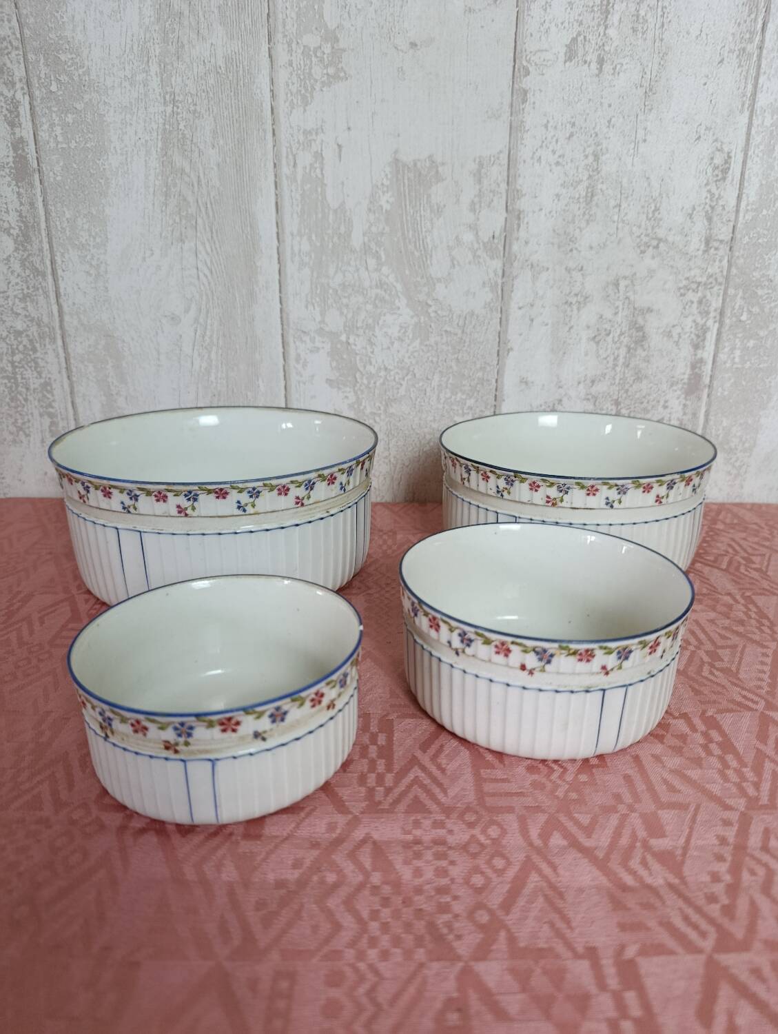Nested porcelain salad bowls decorated