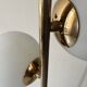 Cluster floor lamp with 3 spherical lamps in gold metal and white glass