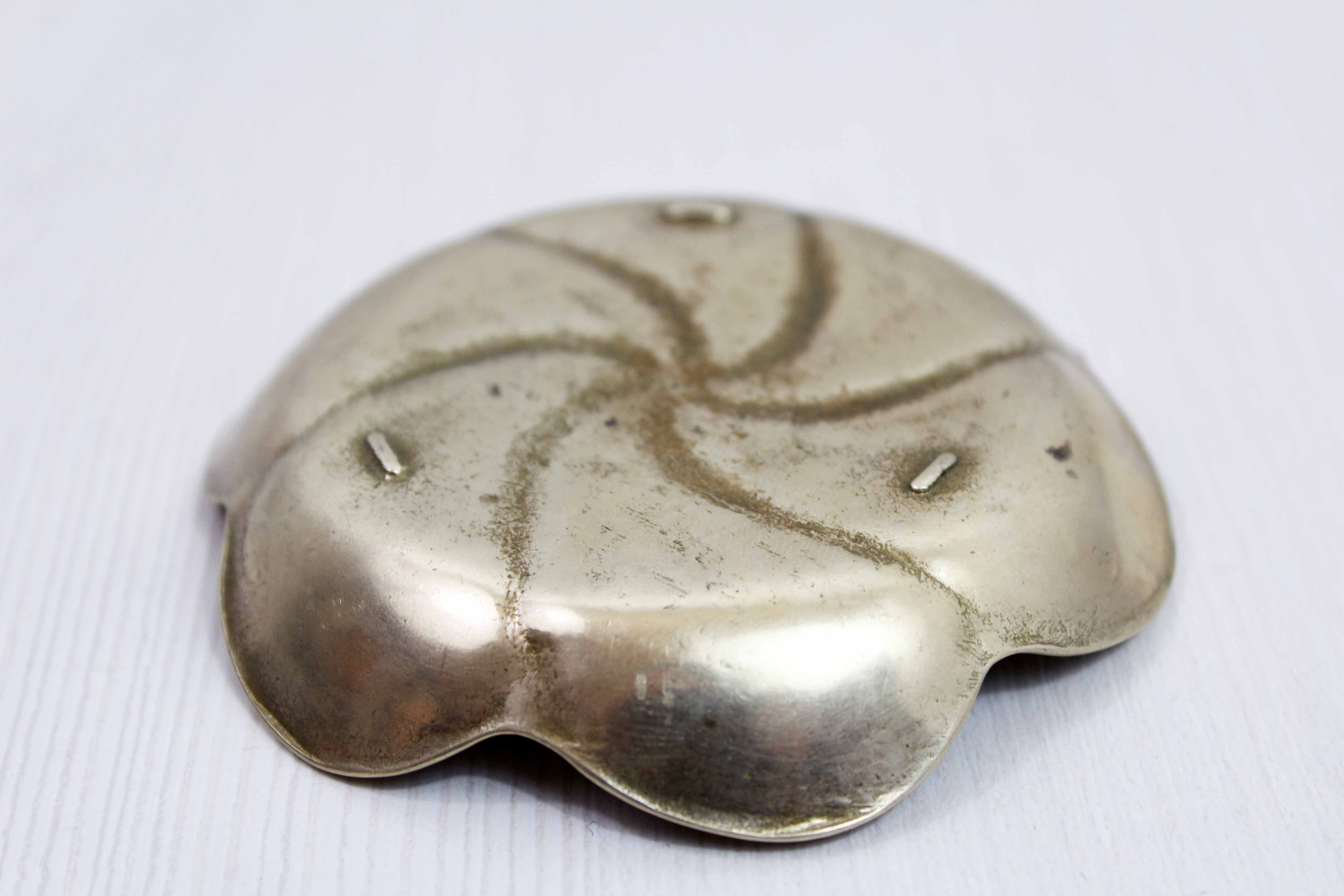 Brass flower candle holder