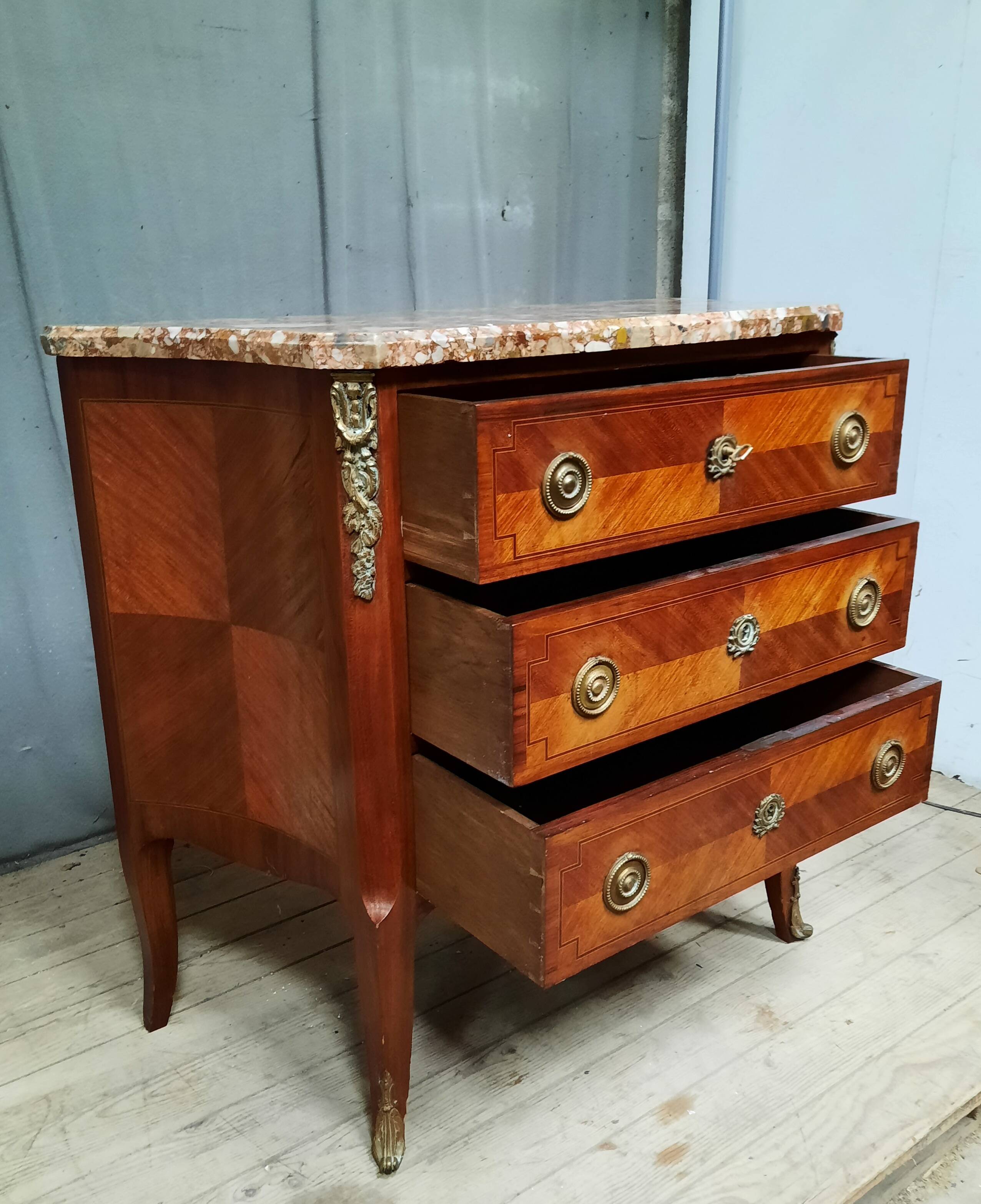 Transitional marquetry chest of drawers