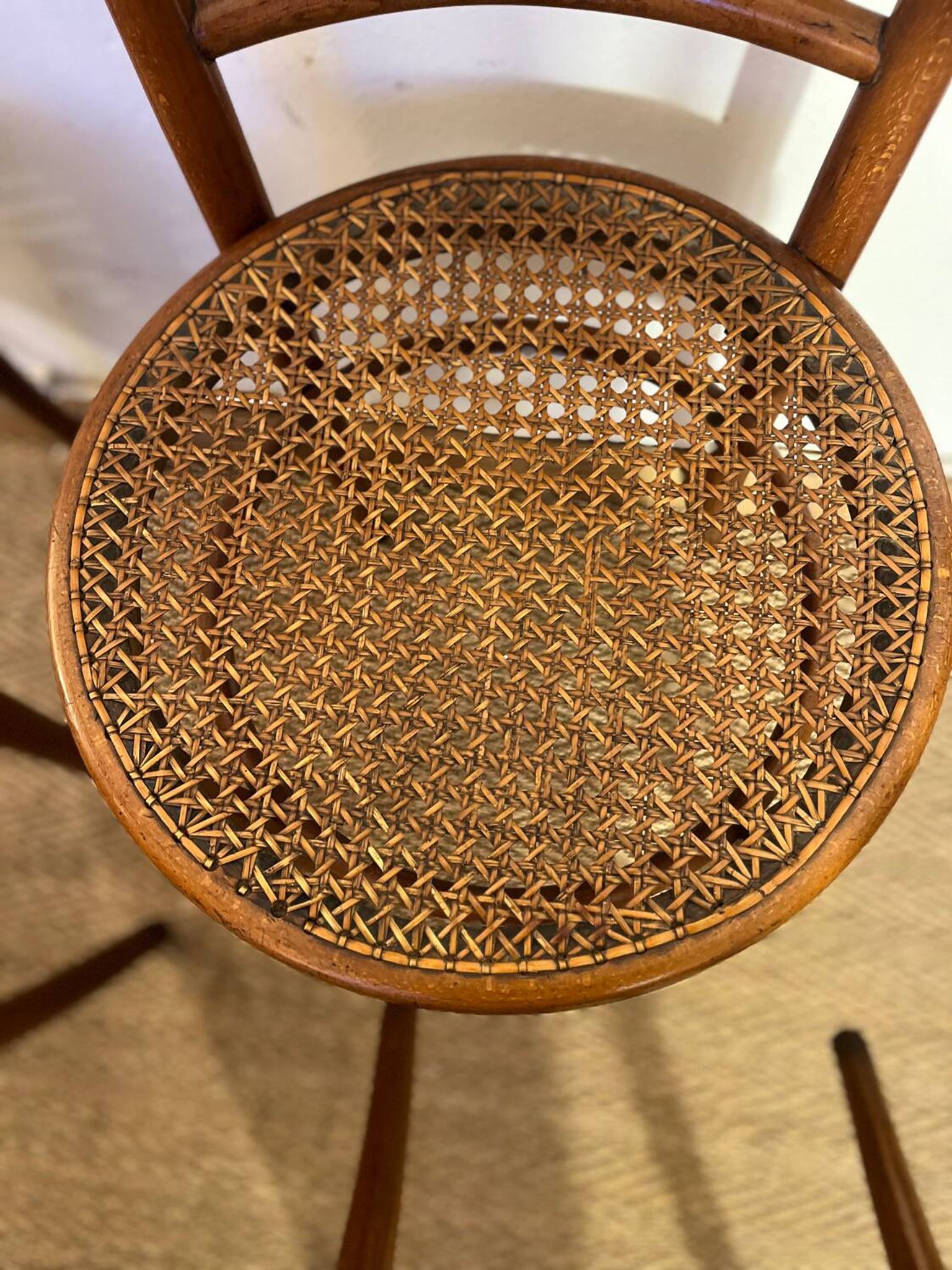 Set of 4 vintage Fischel bistro chairs in curved wood and cane